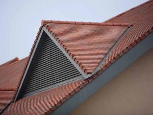 Red Blue Blend roof tiles and cloaked verges at Moseley Hospital